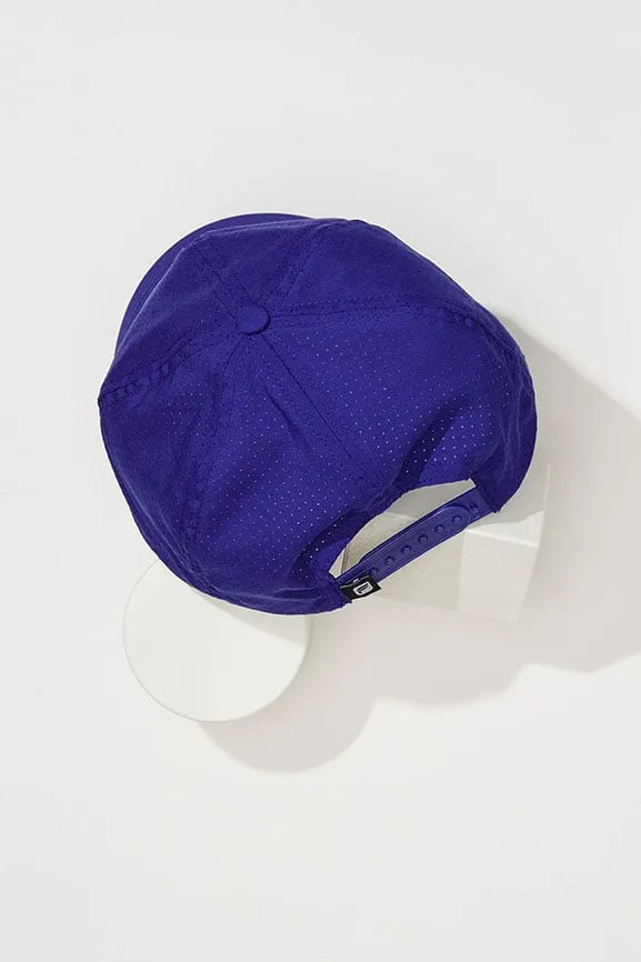 The Perforated Cap